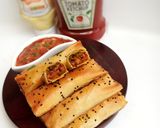A picture of step 13 of Crunchy chicken filo cigars.