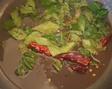 A picture of step 5 of Malabar Kozhi Pidi (rice dumplings in soupy chicken curry).