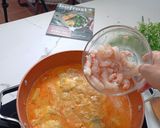 A picture of step 7 of Monkfish Stew with Shrimp and Clams.