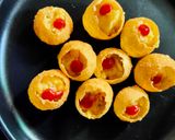 A picture of step 3 of Pizza Pani Puri shots.