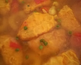 Foto del paso 6 de la receta: Fideuá  con merluza, gambas y guisantes