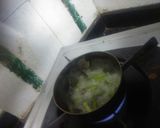 A picture of step 7 of Fafada-Kadhi with Grated Raw Papaya.