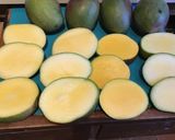 A picture of step 2 of California Farm Green Mangos Pickled in Pepper Oil.