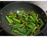 A picture of step 1 of Dry bhindi aloo sabzi without onion and ginger garlic.