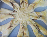 Foto del paso 7 de la receta: Hojaldre Estrella de Nutella