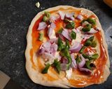 A picture of step 2 of Mini pinwheel pizza bites.