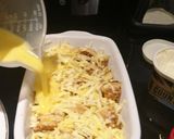 A picture of step 3 of Cheesey marmite crumpet bake.