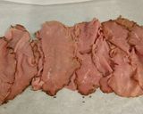 A picture of step 4 of Roast Pork Tenderloin wrapped with Pastrami and served with a Romano / Marscapone Cream Sauce.