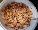 A picture of step 2 of Cheesy Piggy crockpot stuffed peppers.