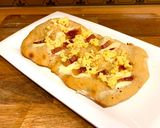 Foto del passaggio 7 della ricetta Pinsa Romana alla Carbonara