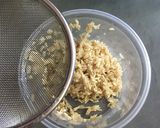 A picture of step 1 of Brown Rice with Green Peas.