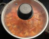 A picture of step 2 of Tomato and Lettuce Zōsui (Japanese Rice Porridge).