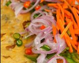 A picture of step 9 of Beloved Egg Chicken (Kathi) Roll.