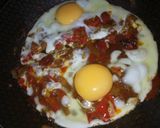 A picture of step 5 of Fried Egg in homemade tomato sauce.