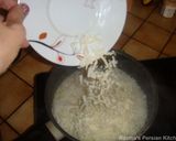A picture of step 5 of Rice cake with vegetables.