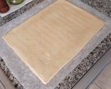 A picture of step 11 of Mini Hazelnut and Walnut Praline Piononos with Pastry Cream.