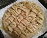 Foto del paso 3 de la receta: Pan de ajo relleno con queso