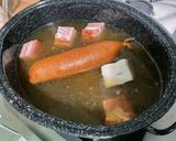 A picture of step 11 of Cabbage Stew with Smoked Sausage, Bacon, Carrots, and Turnips.