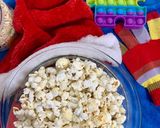 A picture of step 4 of Stove top salty buttery popcorn.