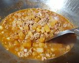 A picture of step 2 of Braised daikon and minced pork.