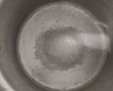 A picture of step 2 of Orange Malpua.