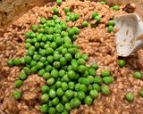 A picture of step 7 of Mushroom Risotto with Peas.