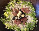 A picture of step 1 of California Farm Chicken Liver Dumpling Matzo Soup with Croutons.