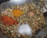 A picture of step 9 of Bharva karele.