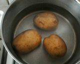 Foto del paso 1 de la receta: Papas rellenas de atún y quesos