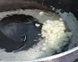A picture of step 1 of Garlic rice balls and baked beans.