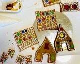 A picture of step 3 of “Eggless Gingerbread House” with icing.
