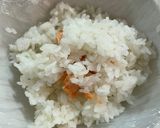 A picture of step 1 of Onigiri with salmon flakes.
