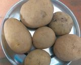 A picture of step 2 of Special onion potato Karela(bitter gourd) sabji.