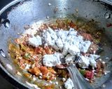 A picture of step 6 of Paneer stuffed kulcha sandwich.
