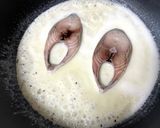 A picture of step 4 of Ilish Macher Malai Curry (Hilsa Fish in Coconut milk gravy) Bengali lunch.