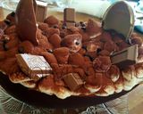 Foto del passaggio 12 della ricetta Uova di cioccolato ripiena con savoiardi e crema al mascarpone senza uova