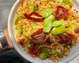 Foto del passaggio 4 della ricetta Cous cous con fave, carote e pomodori secchi