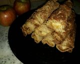 Foto del paso 10 de la receta: Arrolladitos rellenos de manzana, cubiertos de canela y azúcar