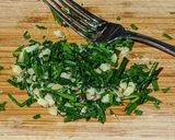 A picture of step 3 of Cacio e pepe Spaghetti Squash with chive pesto.