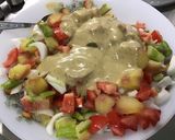 A picture of step 17 of Warm Potato and Asparagus Salad with Bacon, Tomatoes, and Sweet Onion.