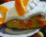 A picture of step 7 of Orange creamsicle poke cake.