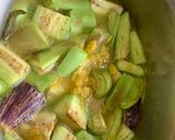 A picture of step 5 of Kerala Style Baingan Dal Curry.