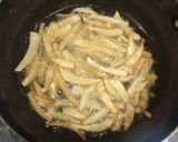 A picture of step 7 of Veg sizzler of sehezwan hakka noodles with sauteed vegetable.