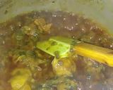 A picture of step 7 of Palak chicken with boiled rice.