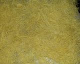 A picture of step 1 of Kunafa and Qashtalia Decorated with Oranges, Strawberries, and Bananas.
