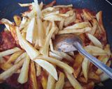 A picture of step 5 of Spicy Chips Masala.