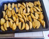 A picture of step 3 of Baked turmeric potato wedges.
