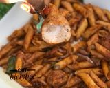 A picture of step 6 of Italian chicken pasta.