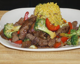Foto del paso 4 de la receta: Lomo saltado con brócoli y pimiento morrón rojo