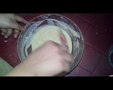 A picture of step 5 of Australian cake.. chocalate toping on vanilla cake.